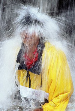 soaking clothes under a waterfall